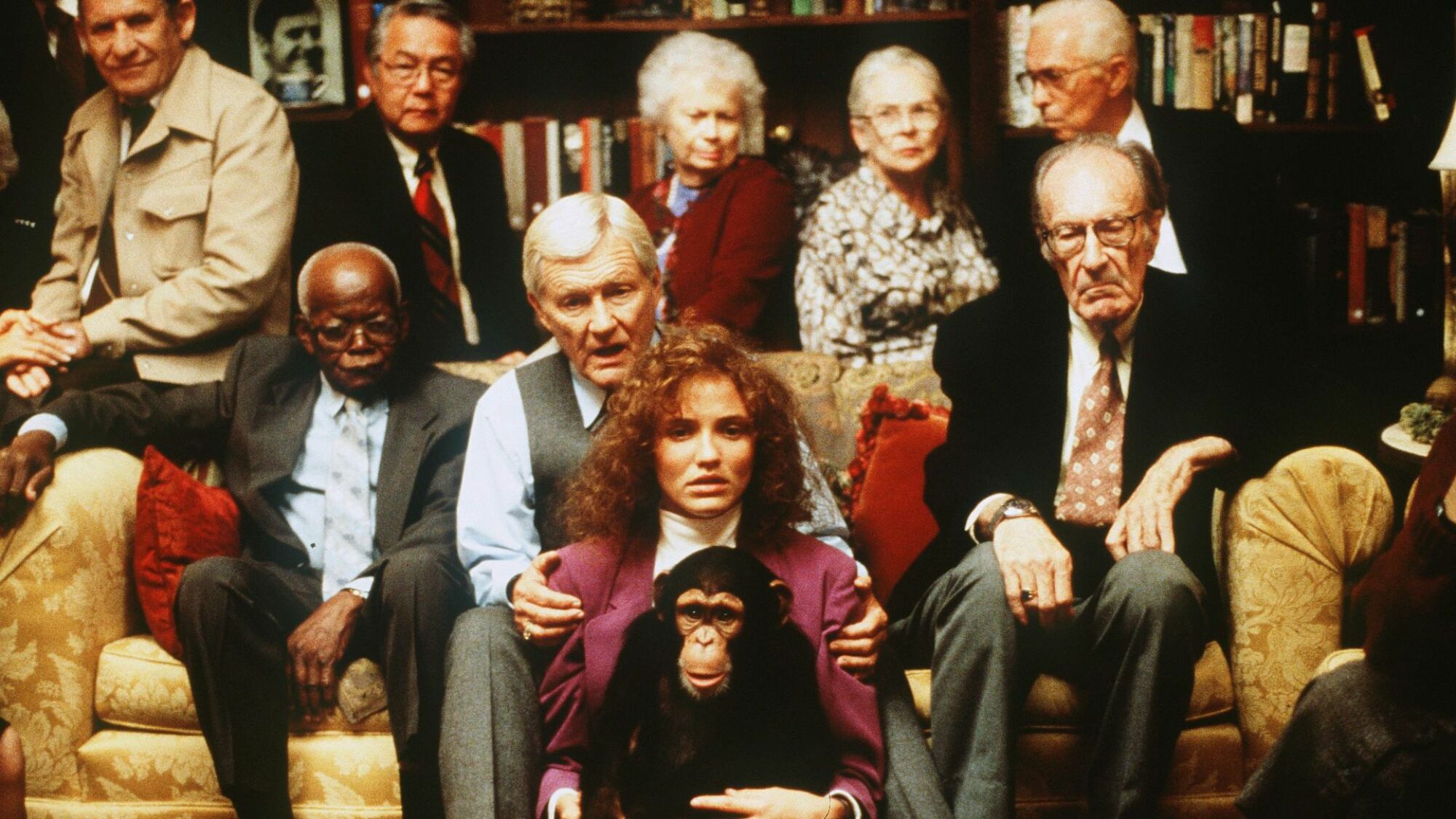 Cameron Diaz is surrounded by quirky characters, and a chimpanzee, in "Being John Malkovich."