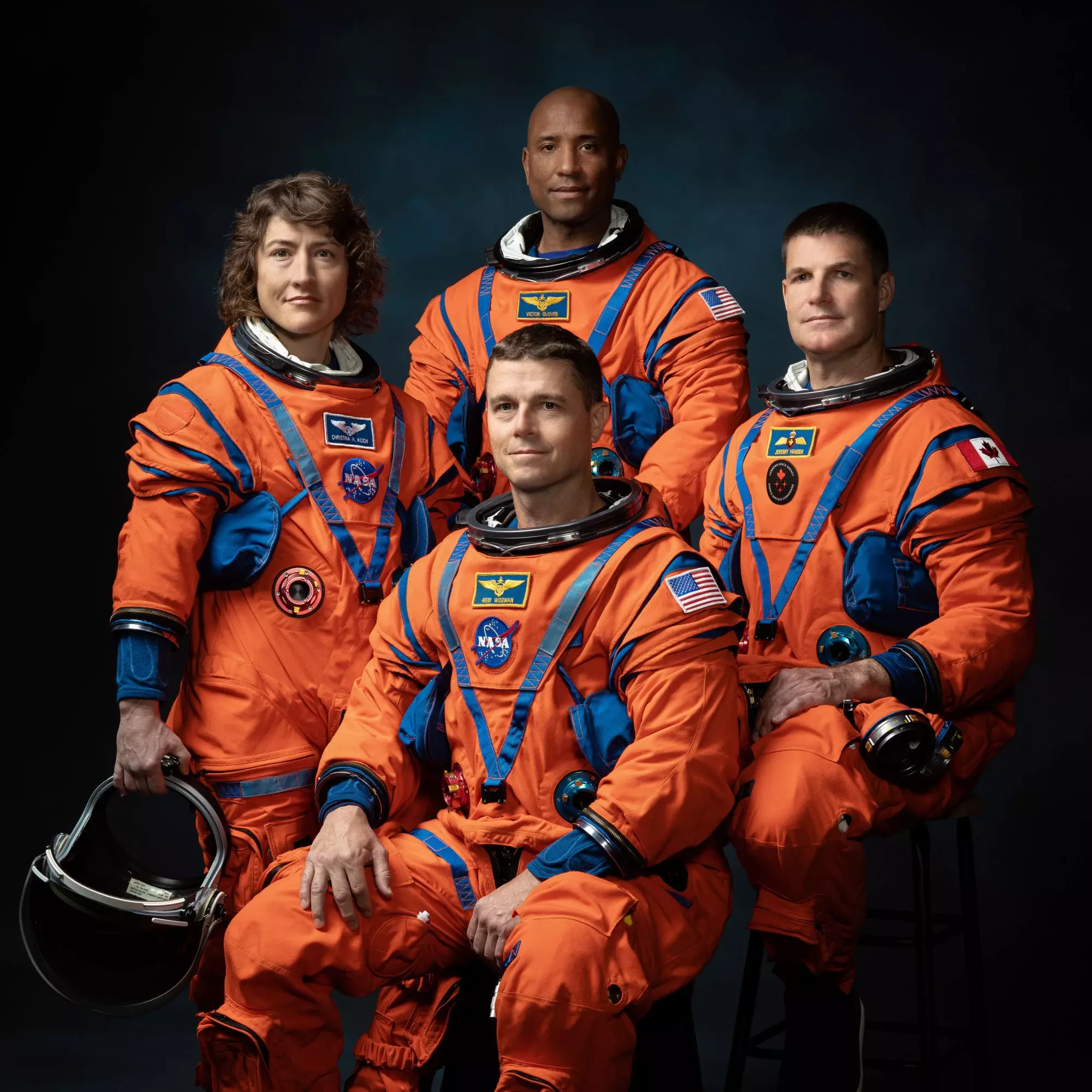 Artemis II crew sitting for portrait