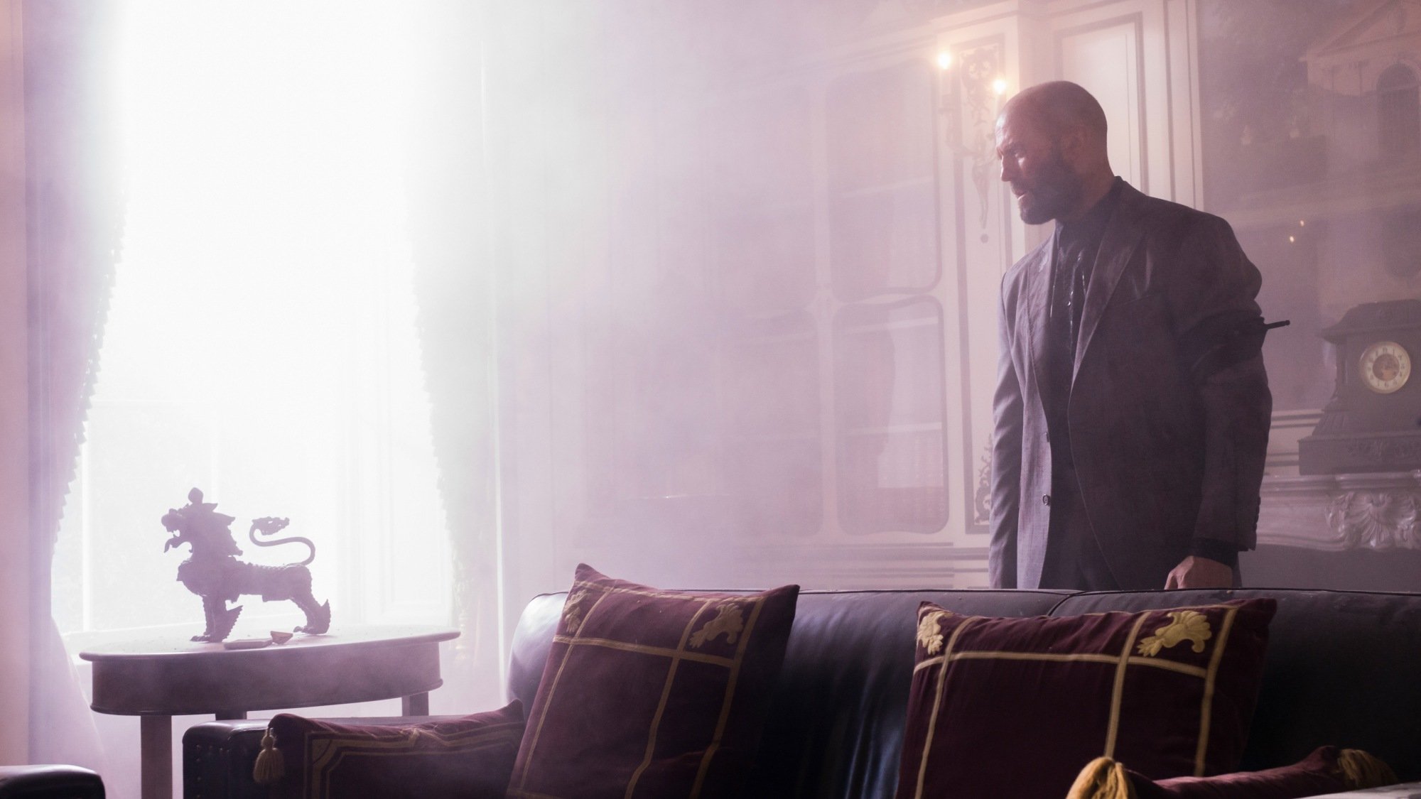 Jason Statham standing still.