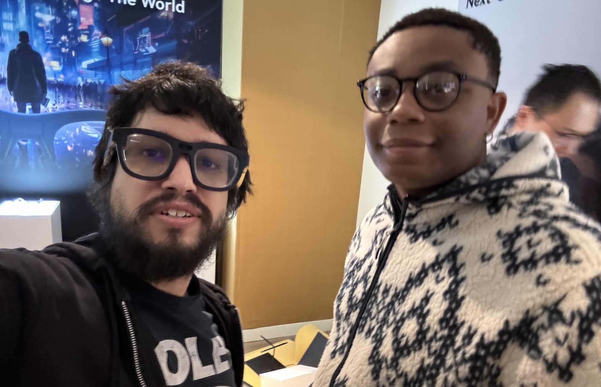 Two men wearing TCL RayNeo X2 Lite