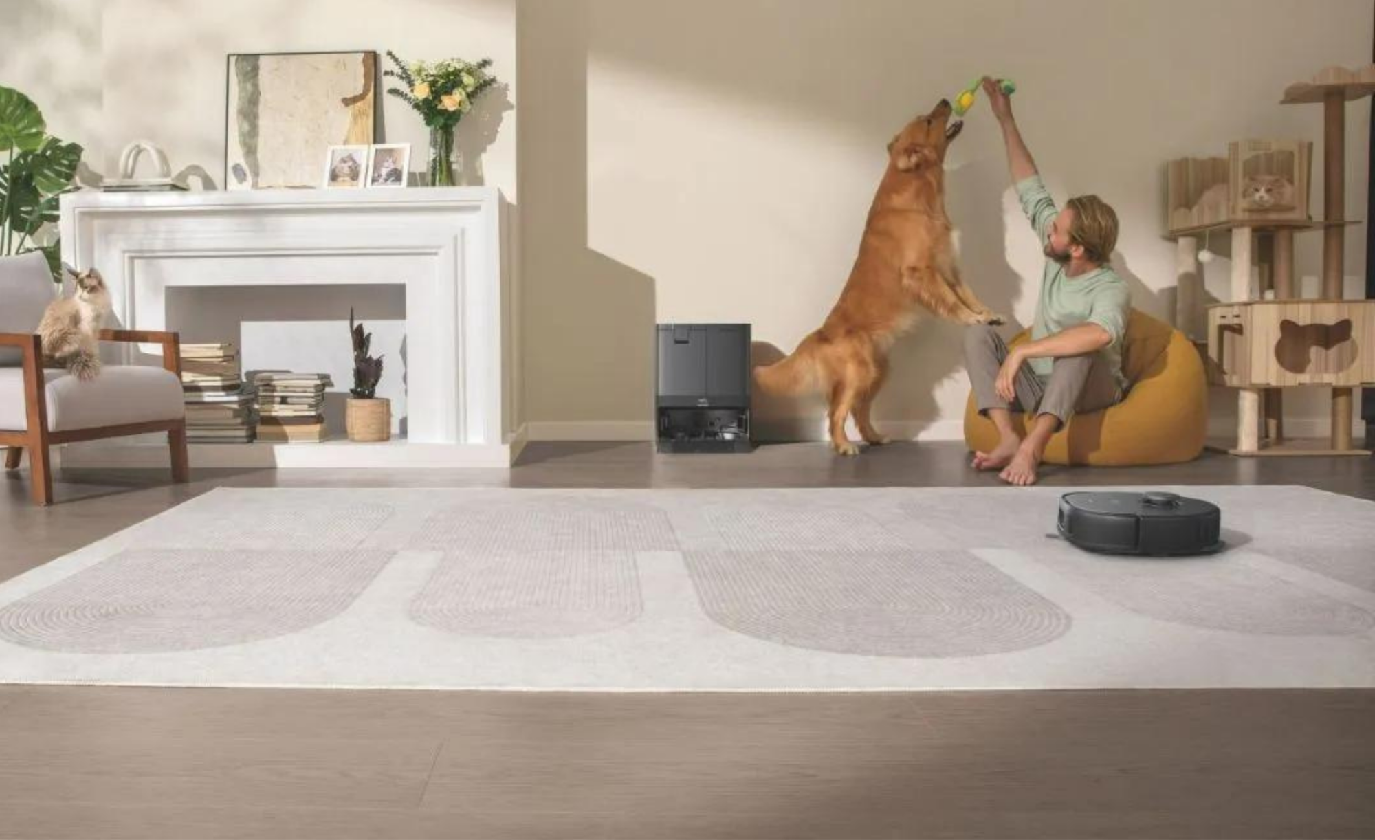 Eufy robot vacuum cleaning rug with person, dog, and cat in background