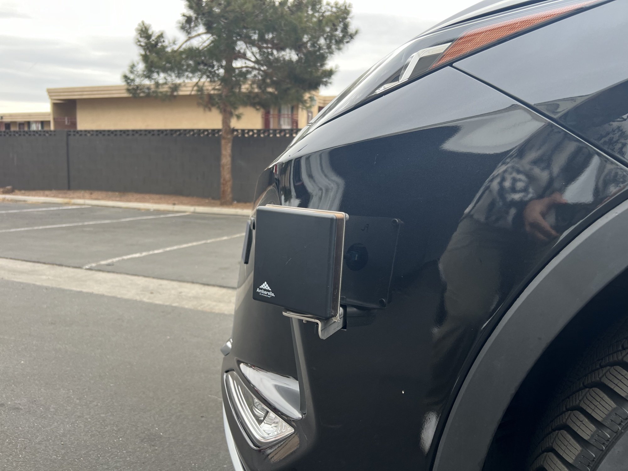 A square pad under the headlight of a car