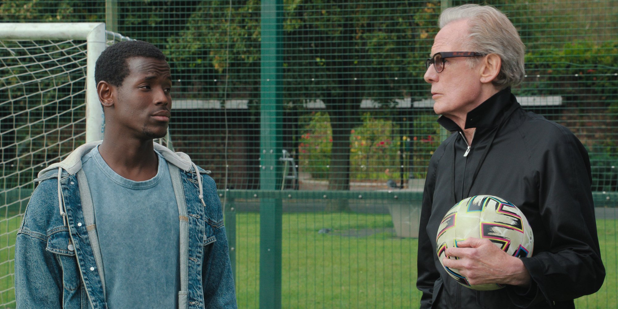Micheal Ward and Bill Nighy in "The Beautiful Game."
