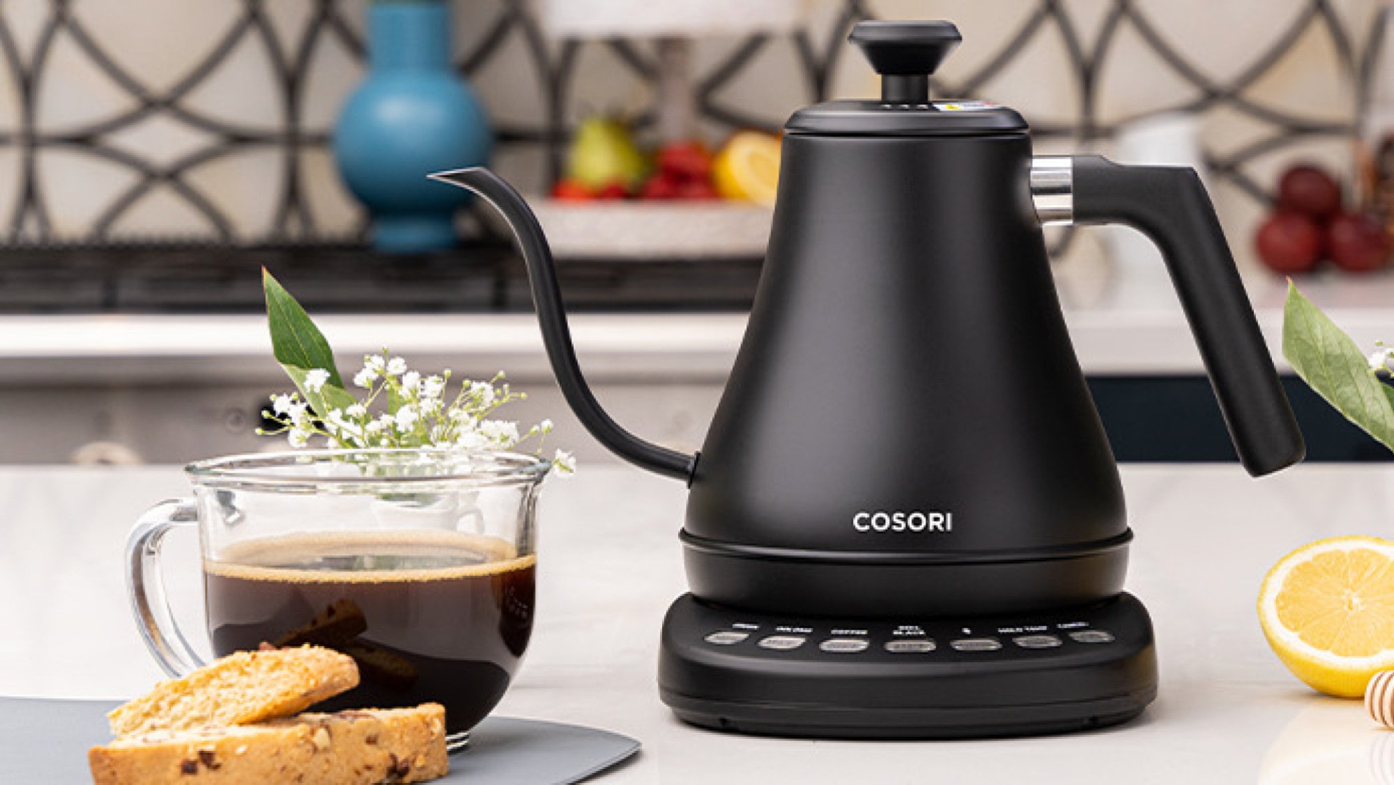 cosori electric gooseneck kettle on counter with coffee mug