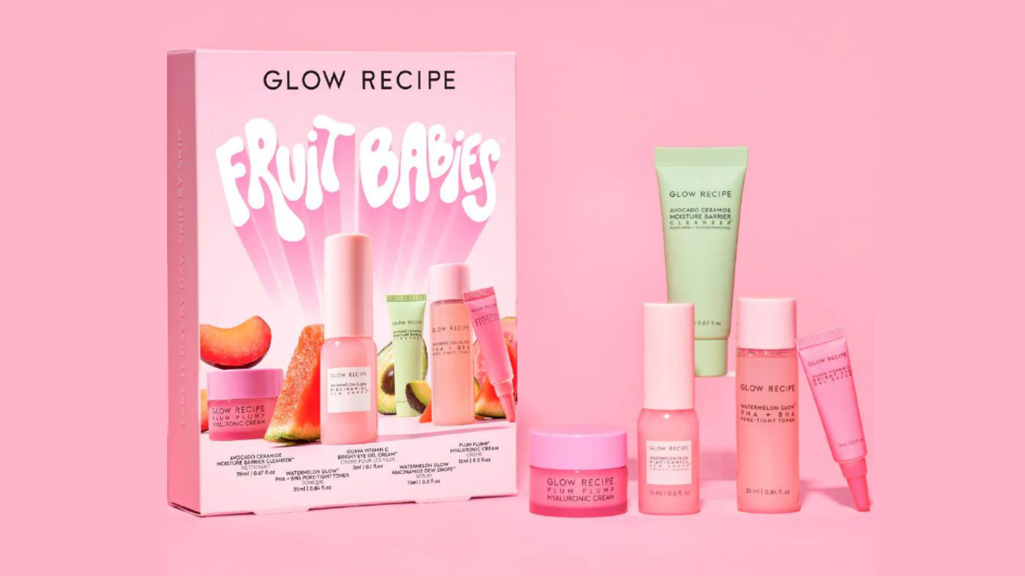 Fruit Babies box depicting the 5-product collection next to the items themselves. Predominant colors are pink and melon green.