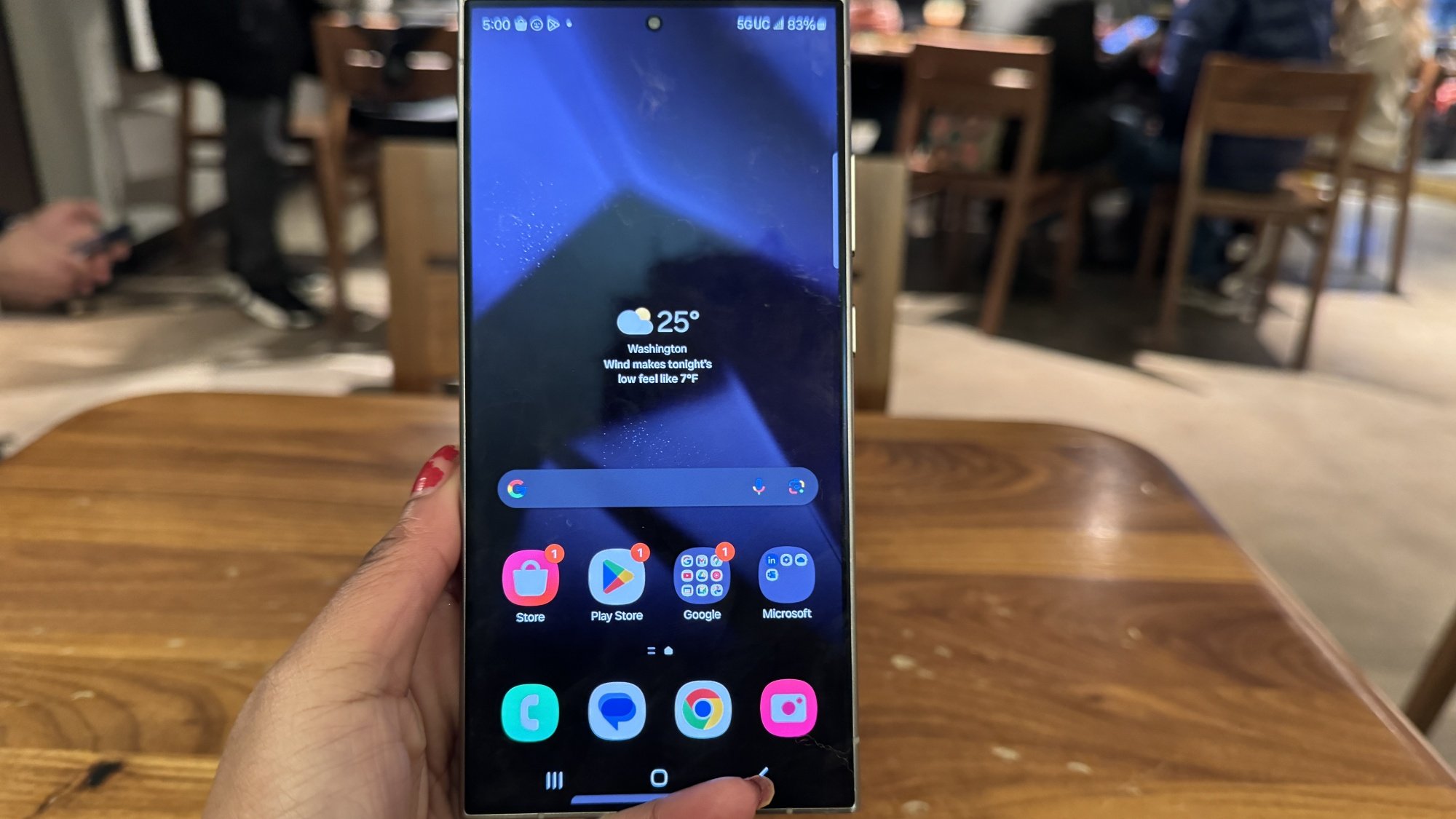 Woman holding Galaxy S24 Ultra