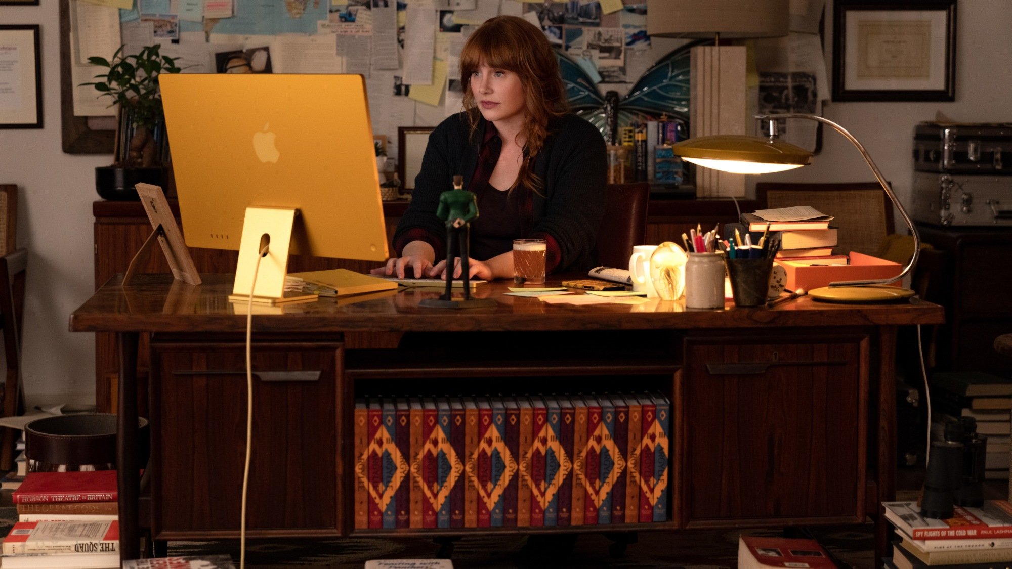 Bryce Dallas Howard sits at a laptop. 