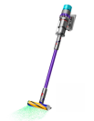 Dyson cordless vacuum with purple extender and green laser coming out of cleaning head
