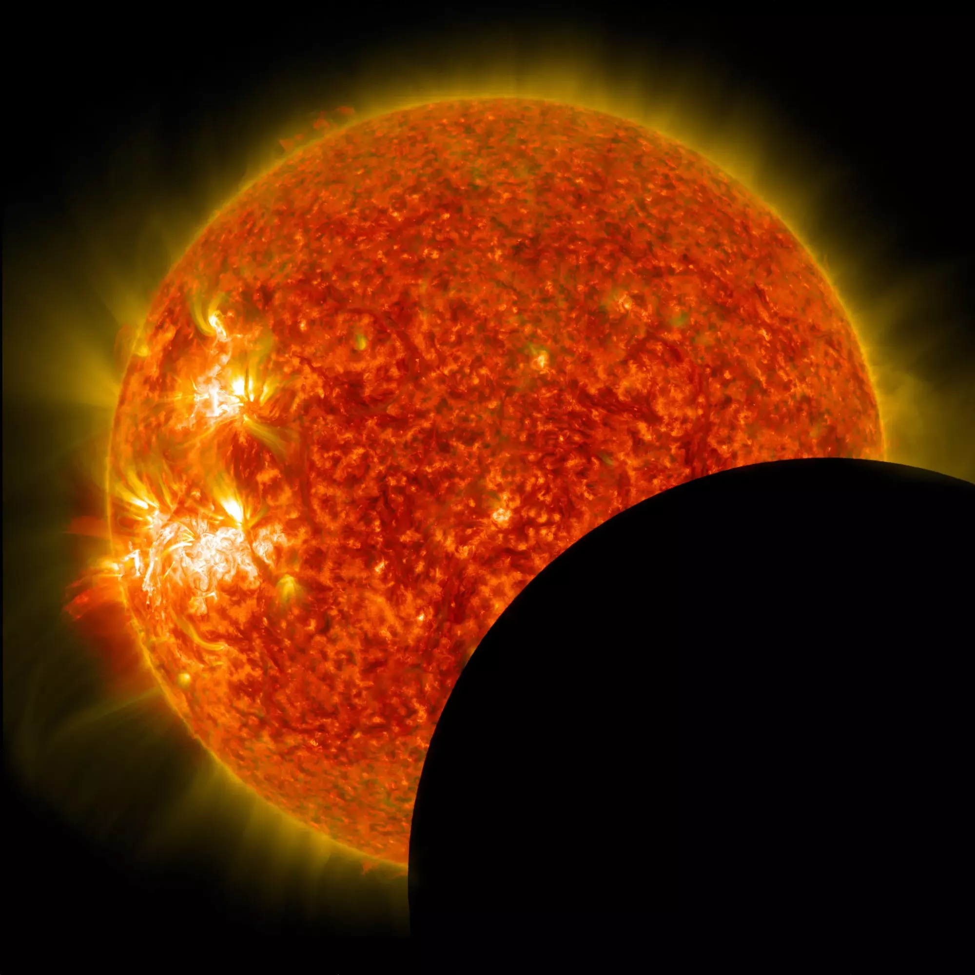 Moon blocking part of the sun during an eclipse