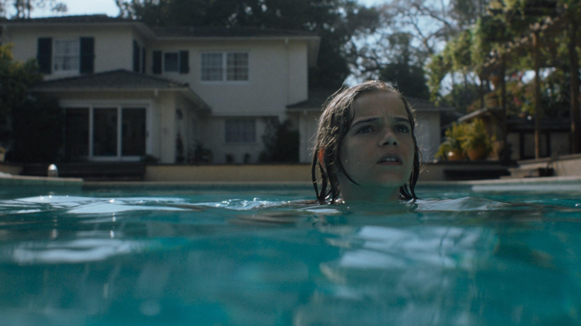 Gavin Warren in a pool in "Night Swim."