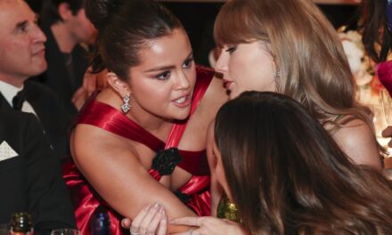 What were Taylor Swift and Selena Gomez gossiping about at the Golden Globes?