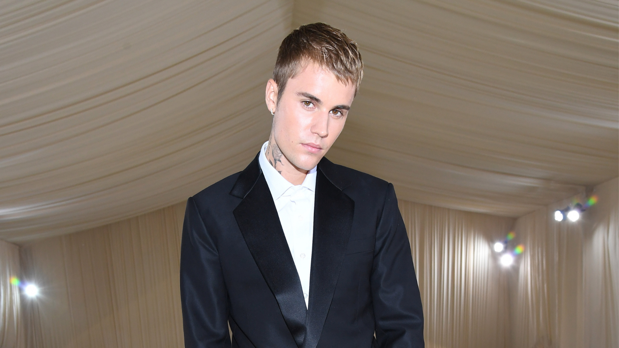 Justin Bieber in a black tux.