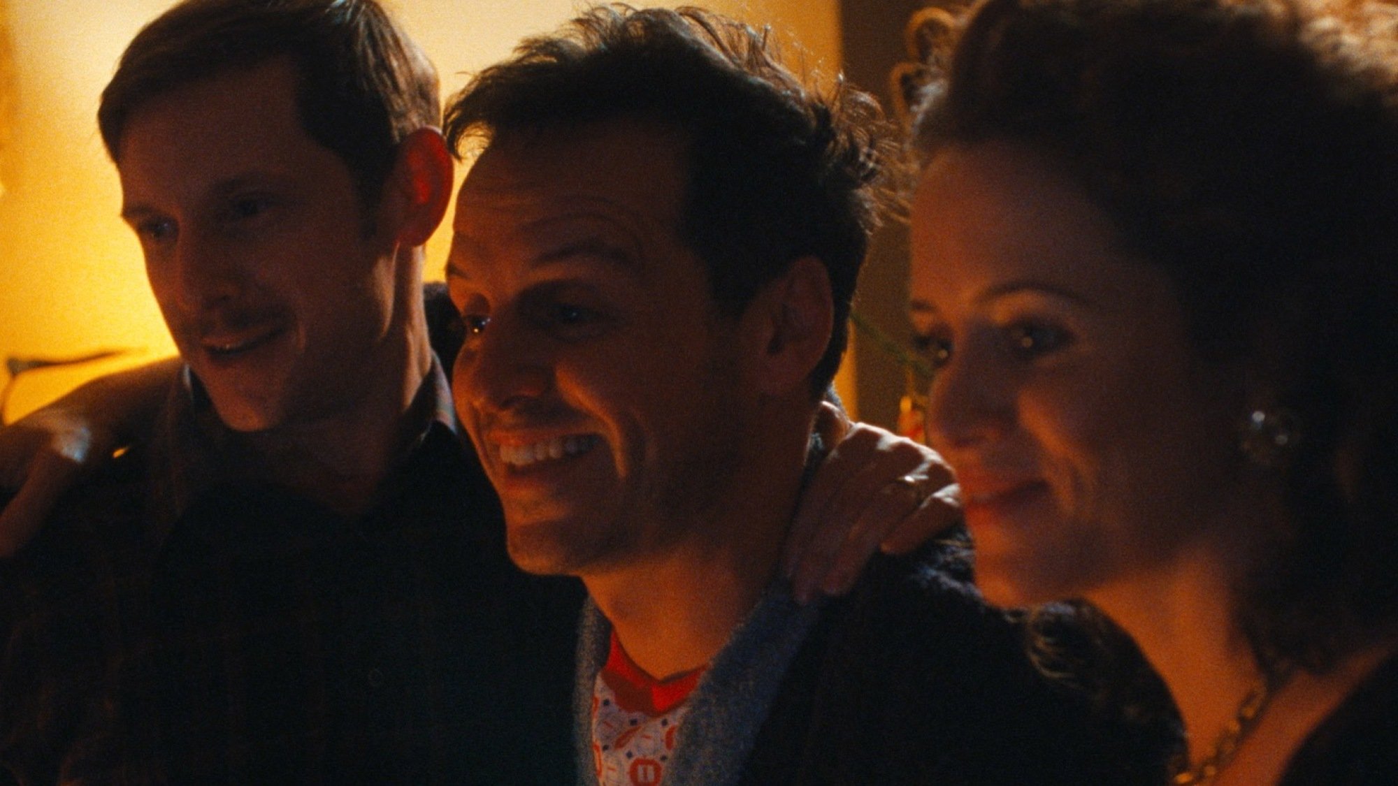 Jamie Bell, Andrew Scott, and Claire Foy play a family in "All of Us Strangers."