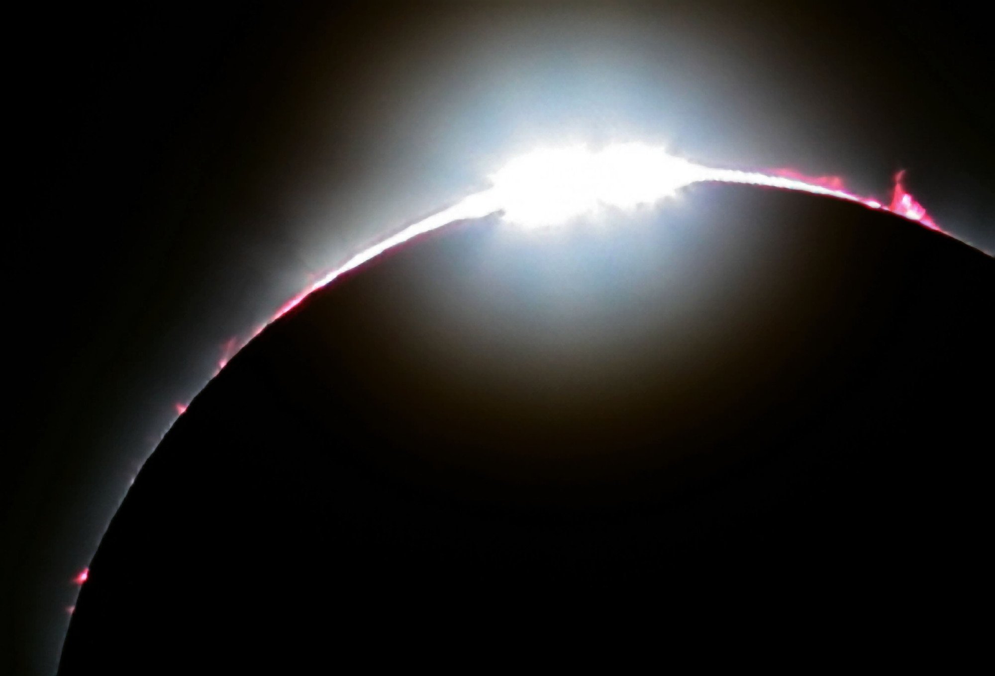 Moon blocking out the last bit of sunlight before an eclipse