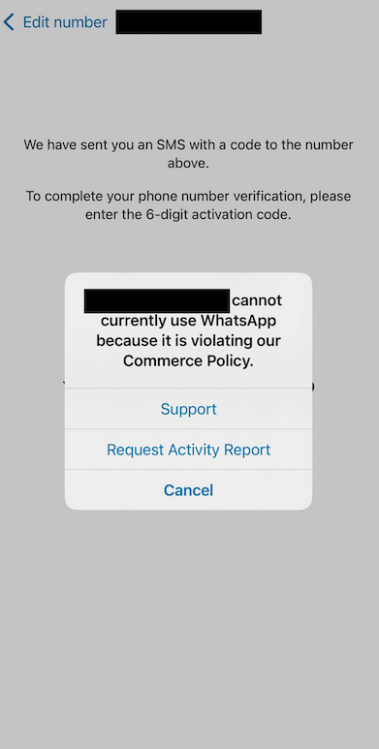 notification from whatsapp reading, "[blocked number] cannot currently use whatsapp because it is violating our commerce policy."