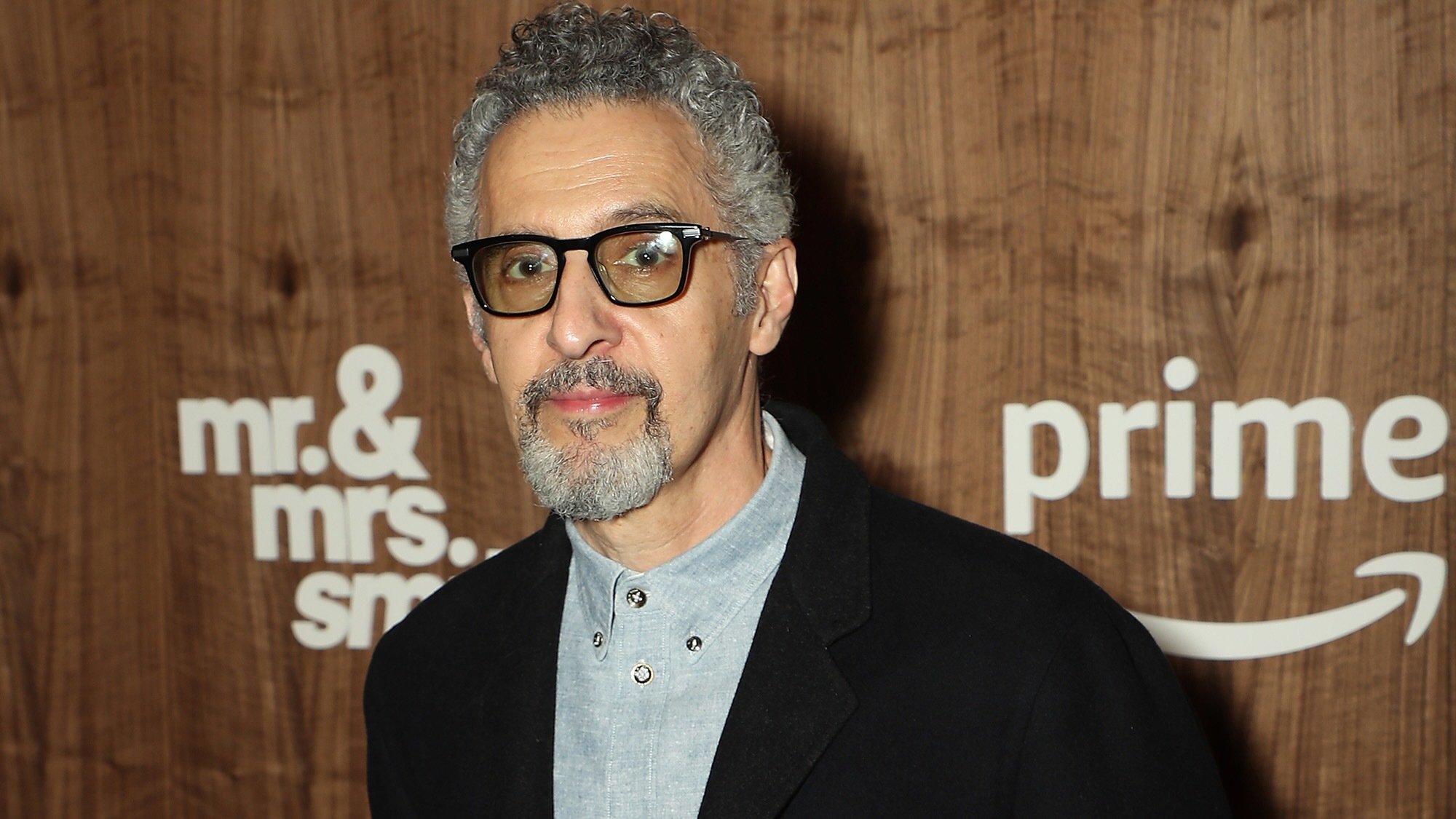 John Turturro poses at "Mr. and Mrs. Smith" premiere.