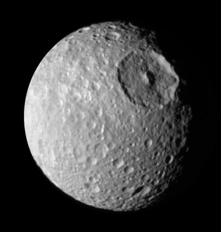 Cassini probe observing Mimas' giant Herschel Crater