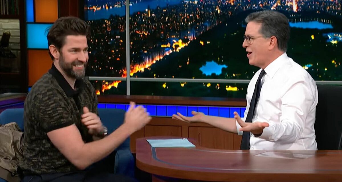 John Krasinski takes on Stephen Colbert in a brutally tense arm wrestle