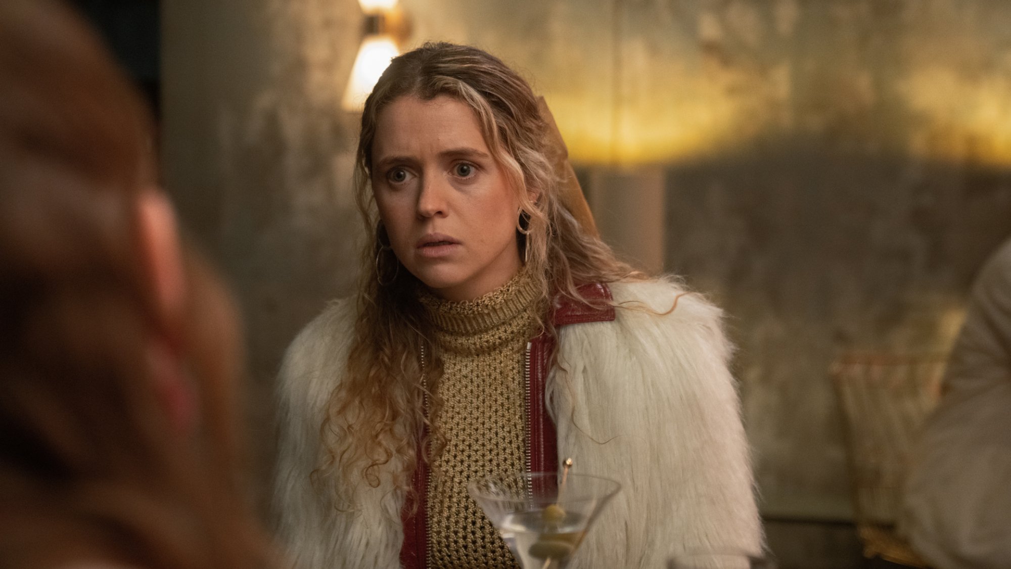 Carrie (Sofia Oxenham) looks concerned in the TV series "Extraordinary"