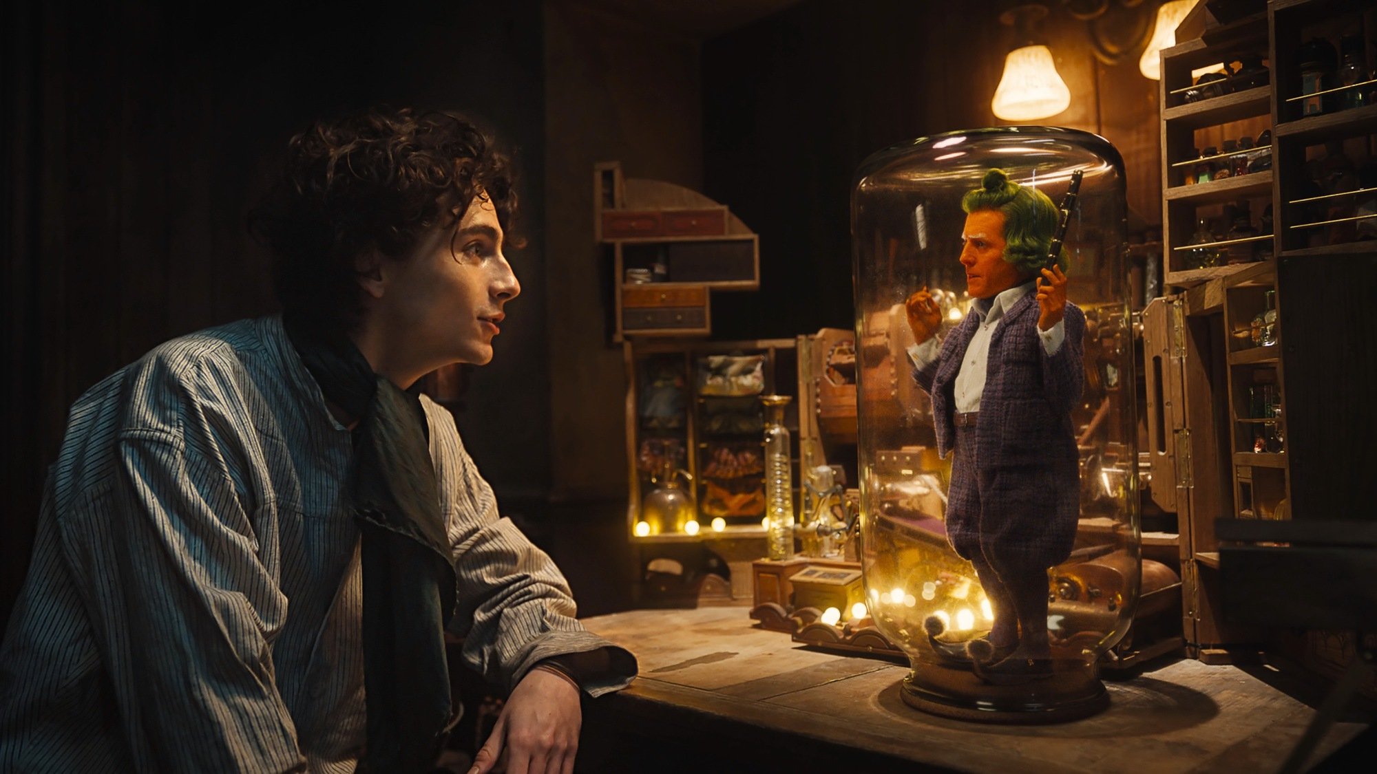 Timothée Chalamet as Willy Wonka, Hugh Grant as Lofty in "Wonka."