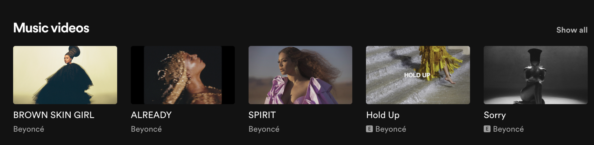 A screenshot of Spotify showing a carousel of Beyonce music videos.