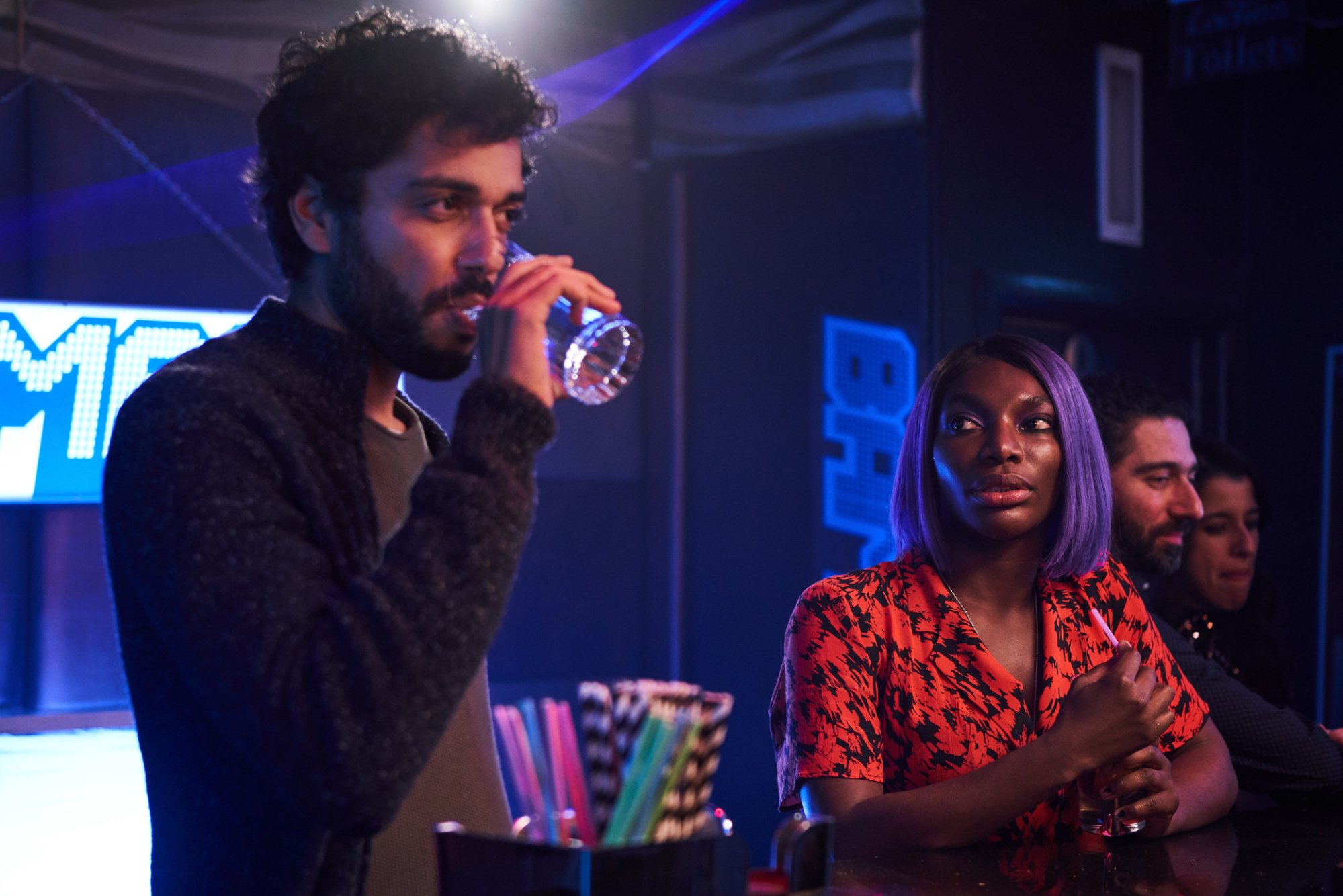 A couple at a night club.