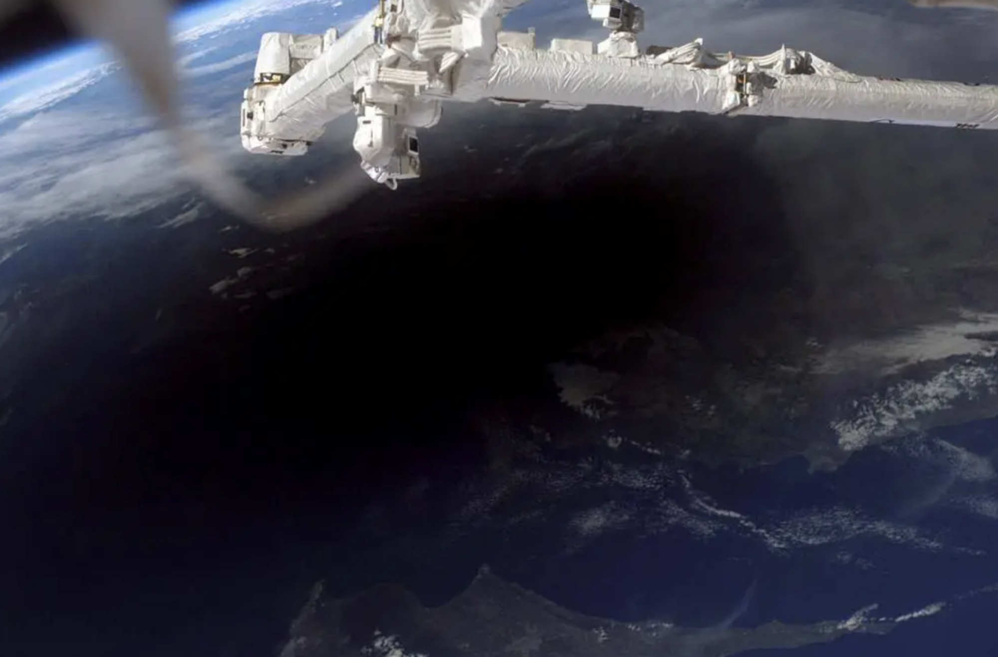 The moon casting a shadow across southern Turkey, northern Cyprus, and the Mediterranean Sea in March 2006.