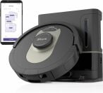 Shark robot vacuum on self-emptying dock and smartphone with home map on screen