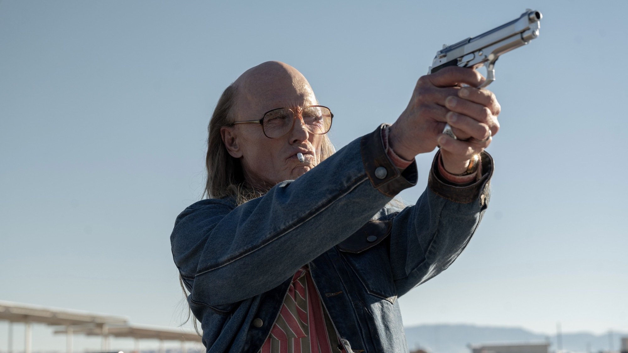 Ed Harris wearing a skullet. 