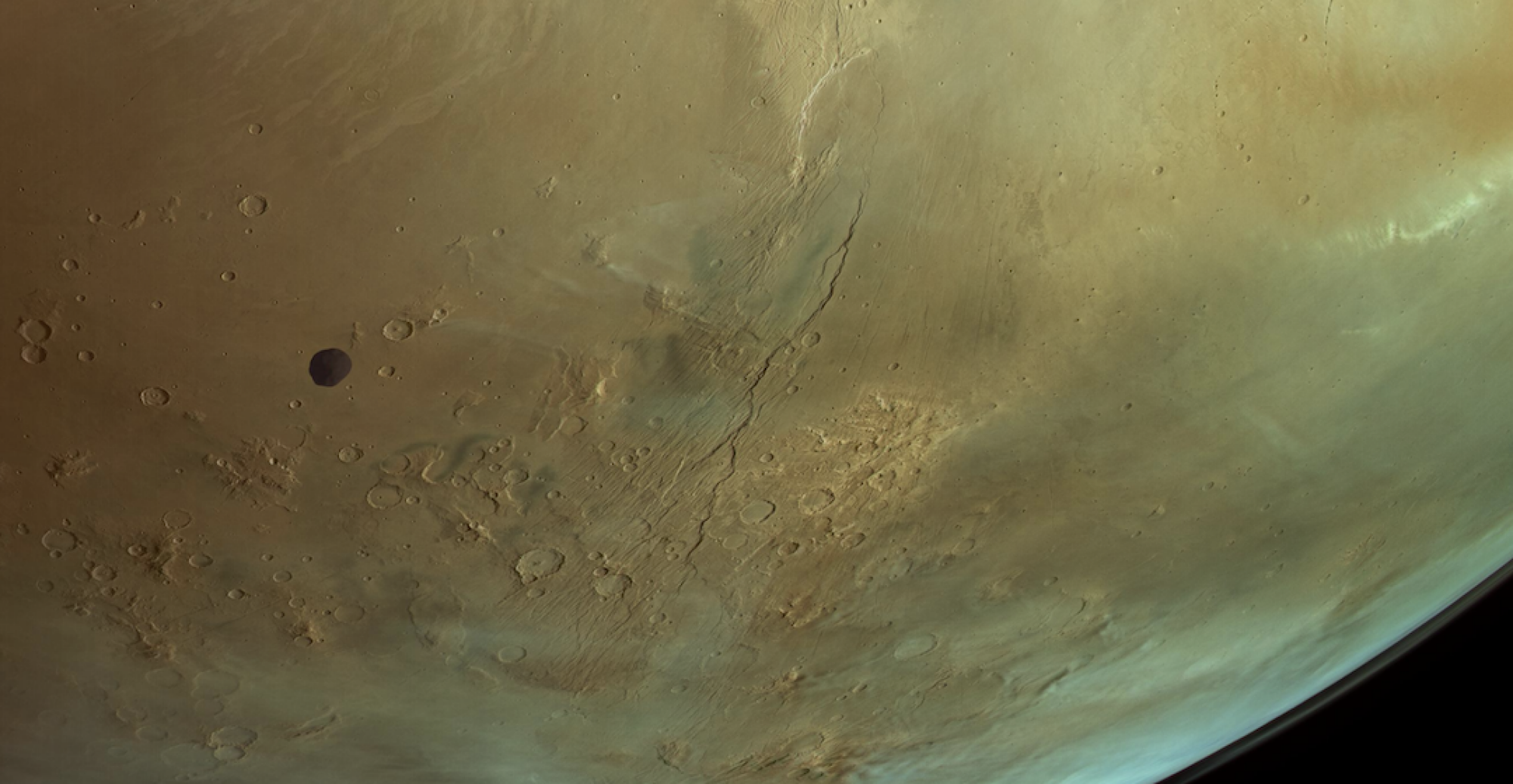 A close-up view of Phobos as it orbits Mars.