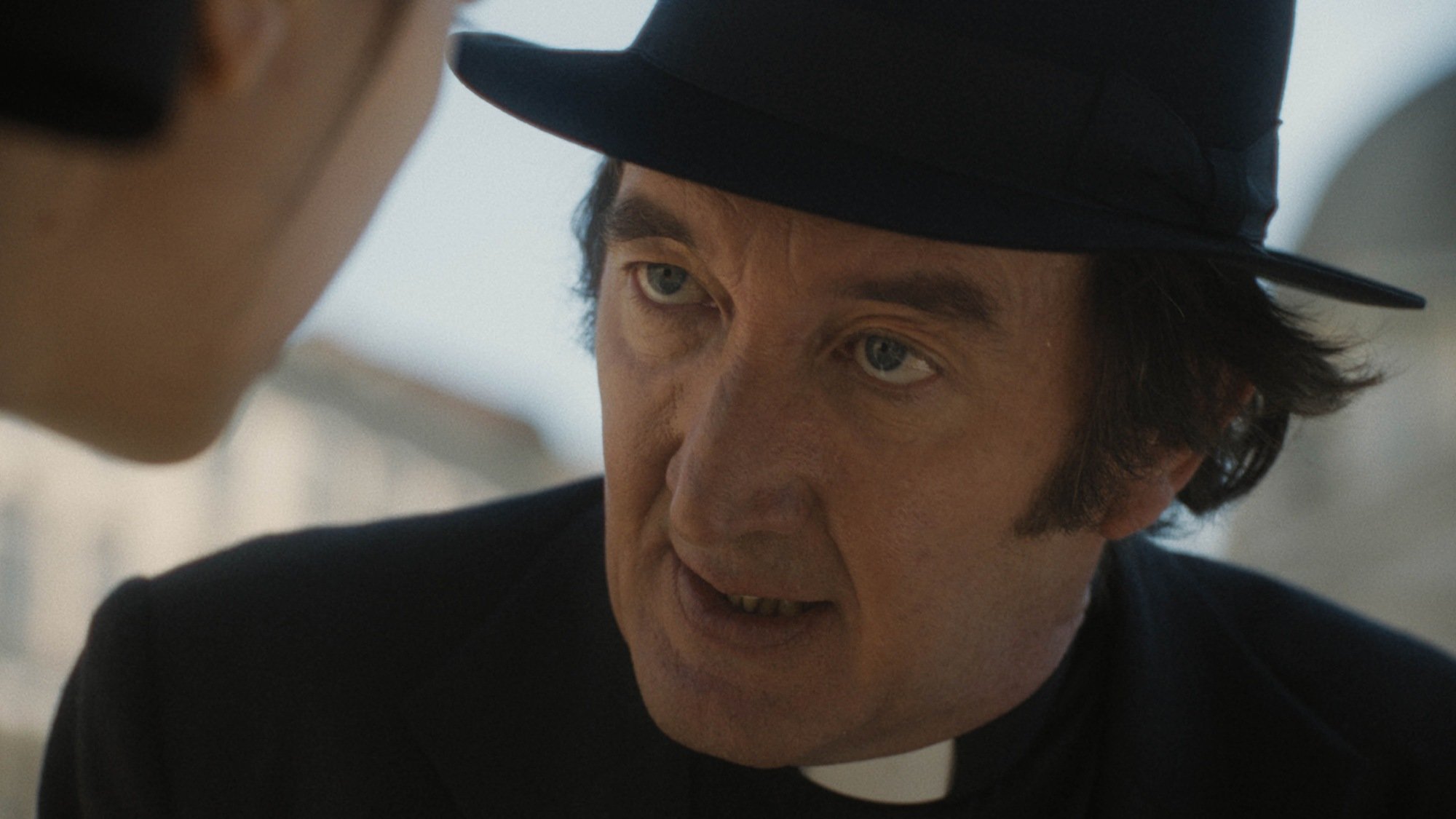 Ralph Ineson as Father Brennan in 20th Century Studios' THE FIRST OMEN.