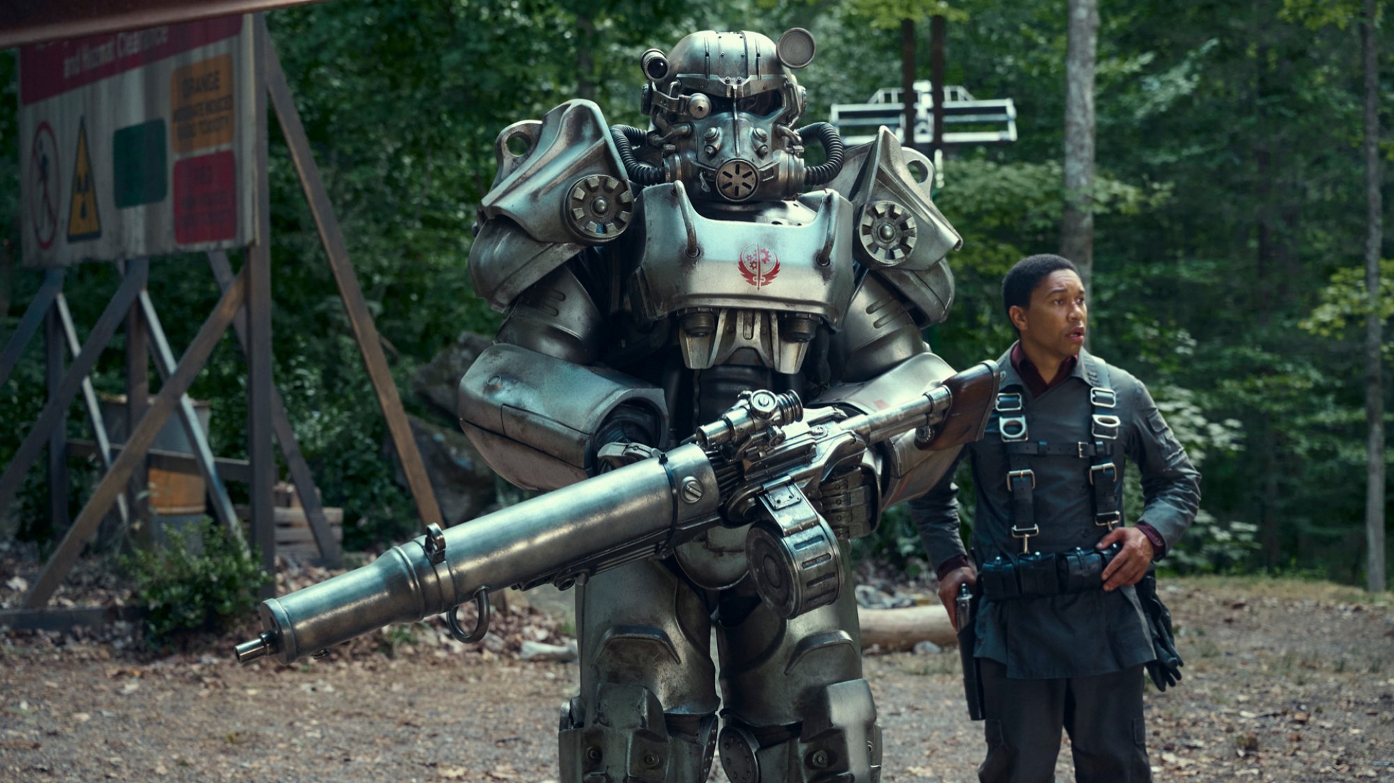 Aaron Moten as Maximus in "Fallout" beside his soon-to-be power armor.